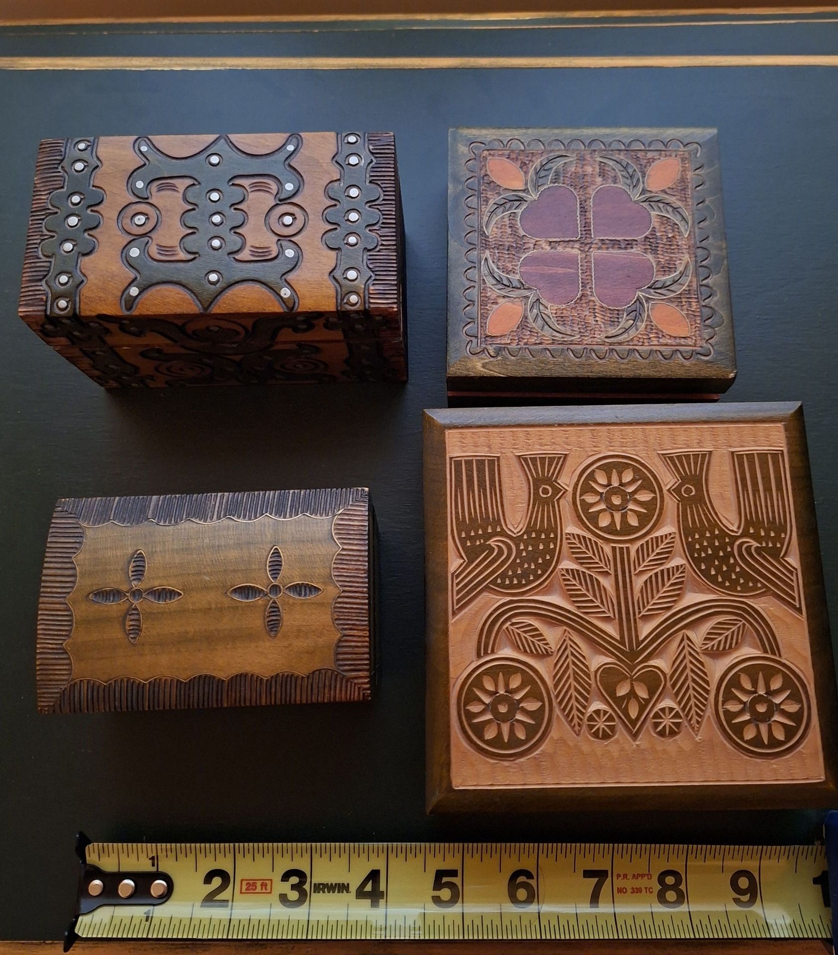 Set of Four Carved Wooden Boxes - image 1 of 7