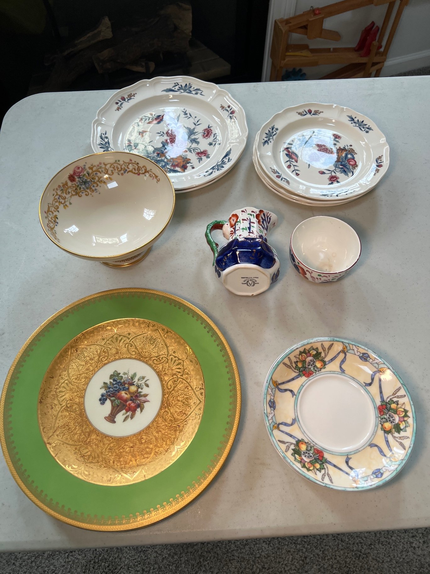 Assorted ceramic dinnerware with floral and fruit motifs - image 1 of 16