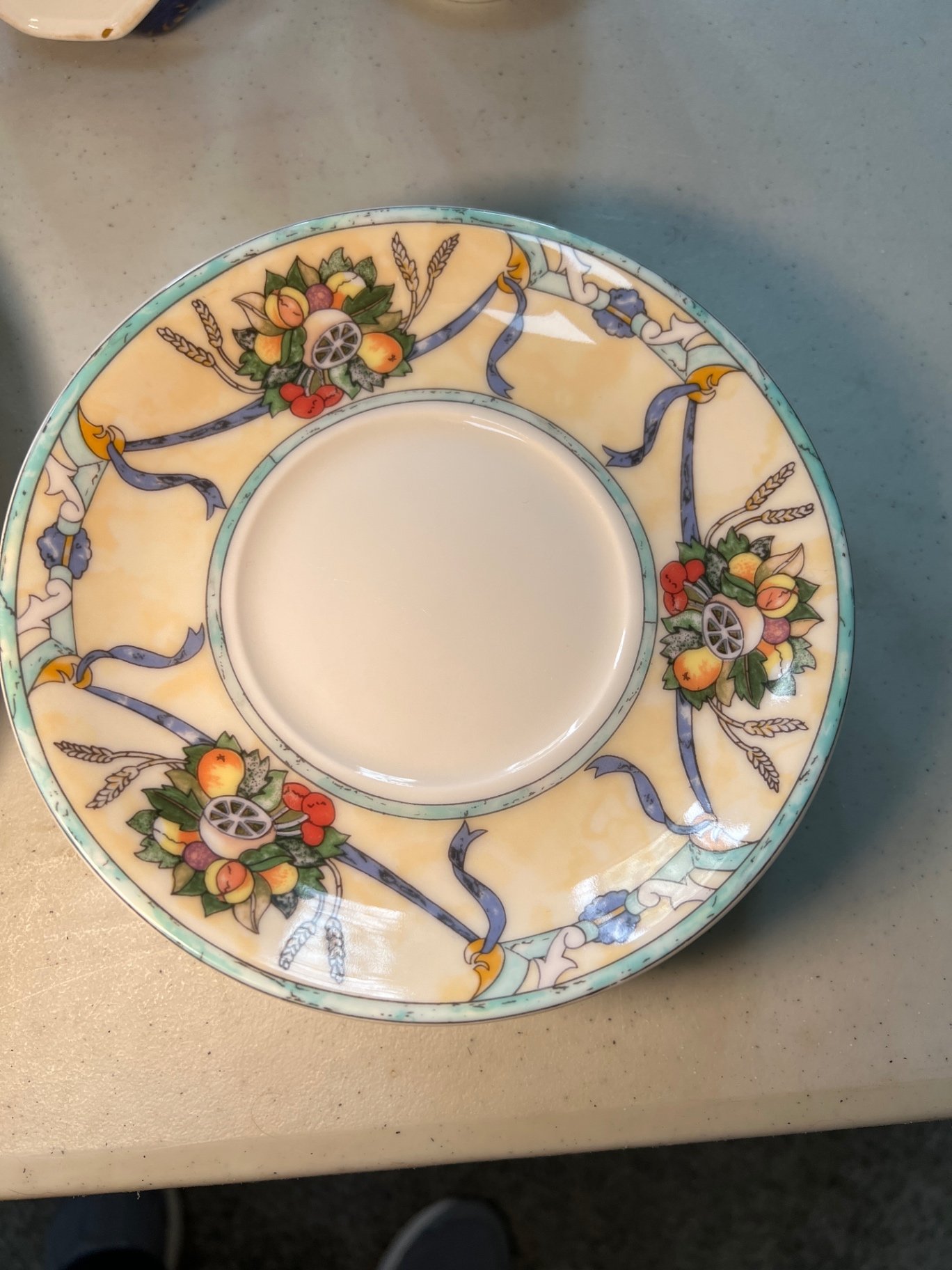 Assorted ceramic dinnerware with floral and fruit motifs - image 10 of 16