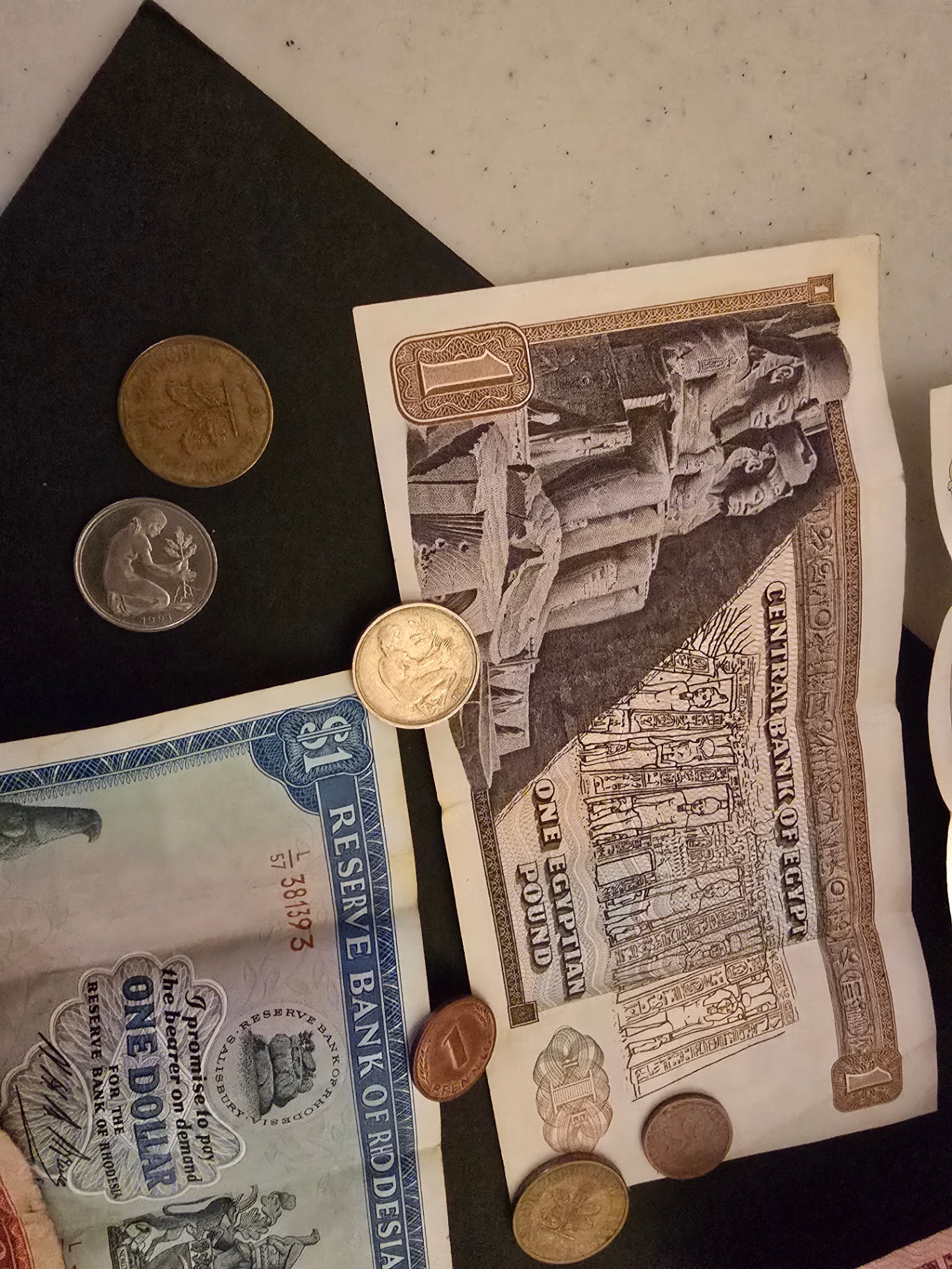 Assorted international banknotes and coins - image 11 of 14