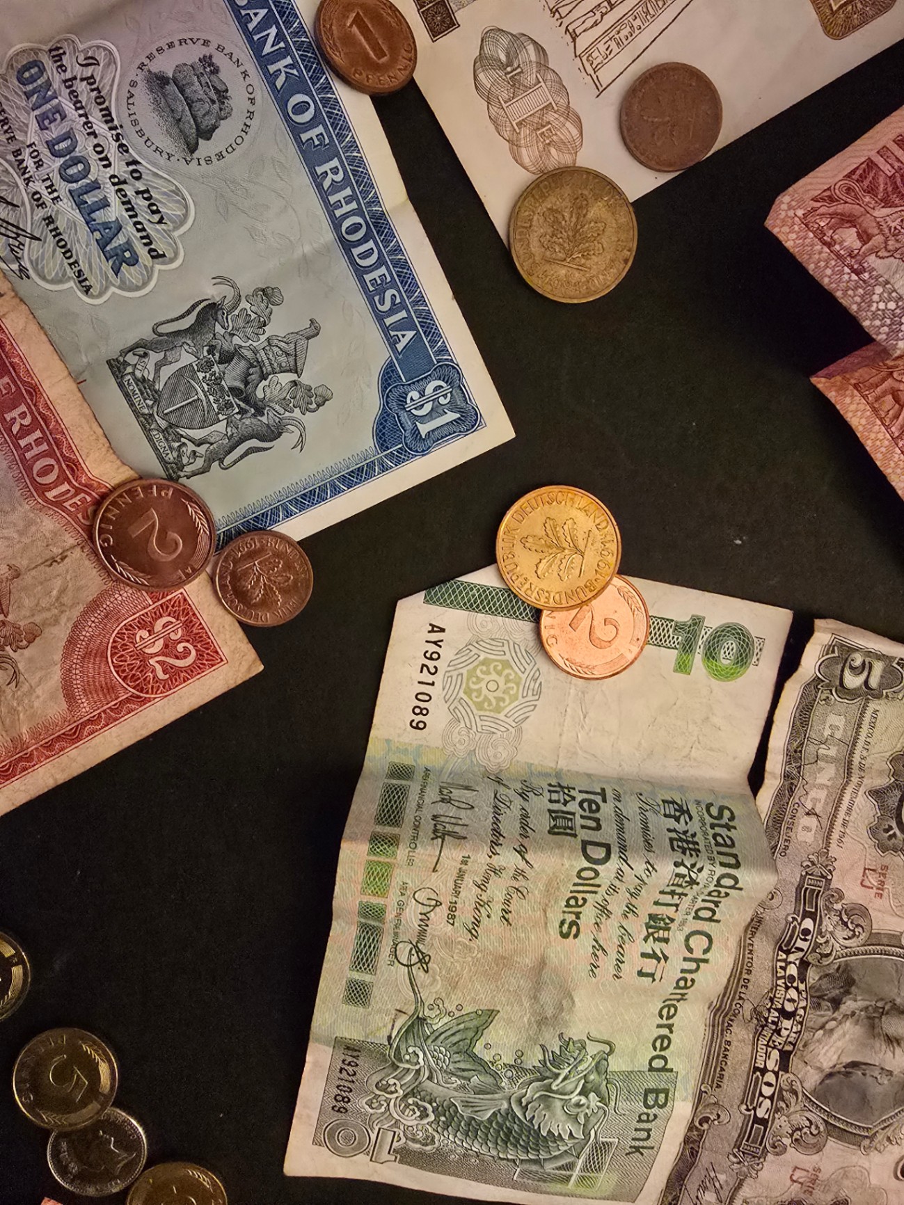 Assorted international banknotes and coins - image 10 of 14