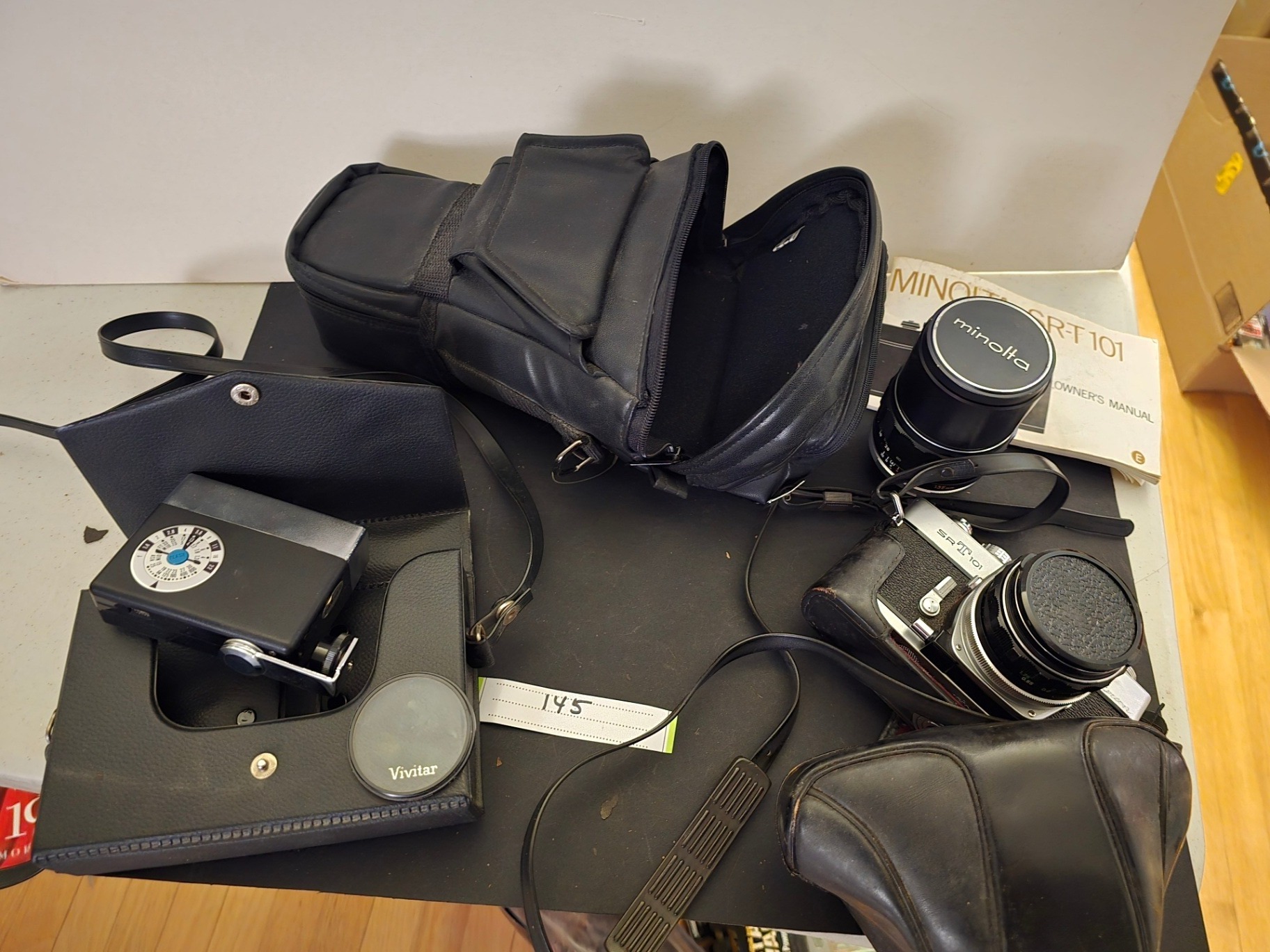 Minolta SR-T101 135mm camera with accessories - image 1 of 18