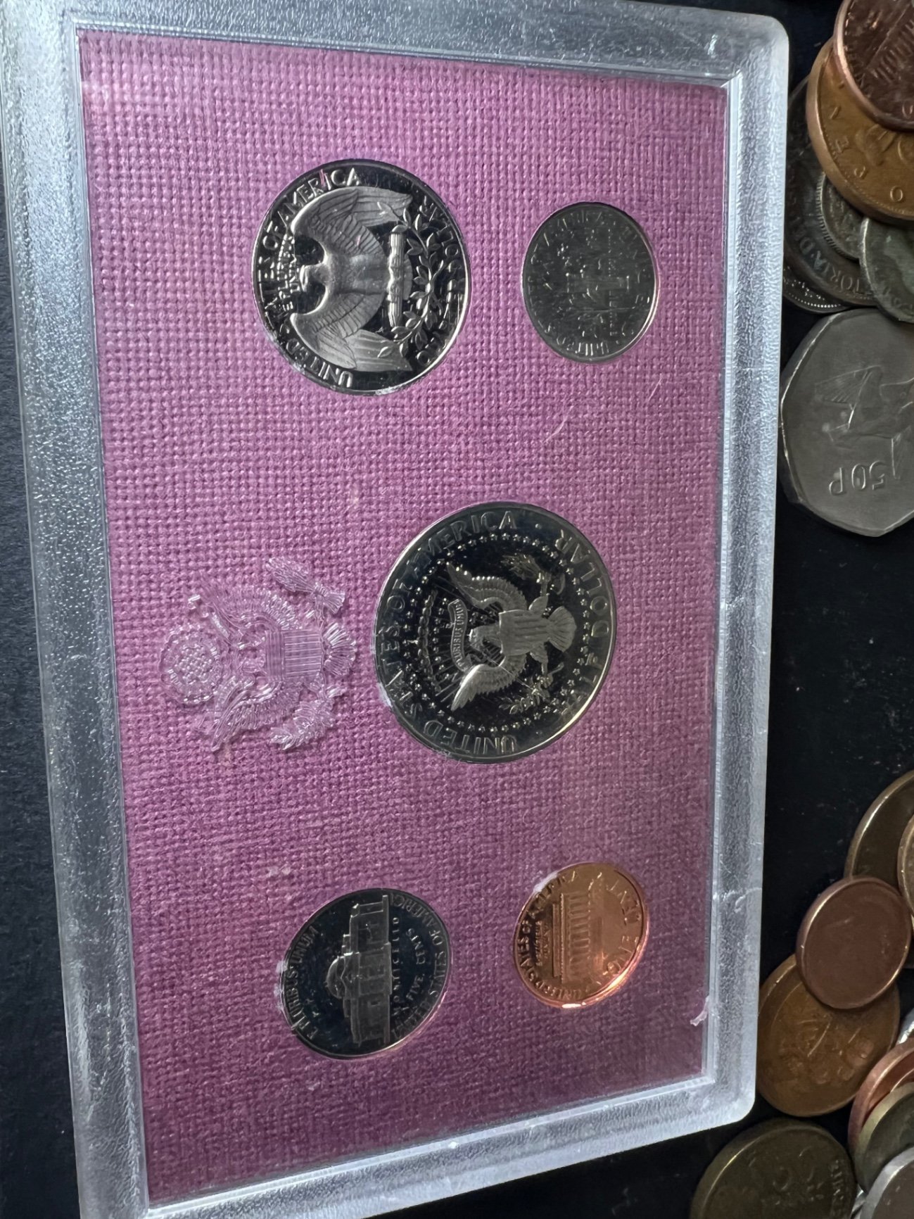 Assorted international coins and currency - image 17 of 18