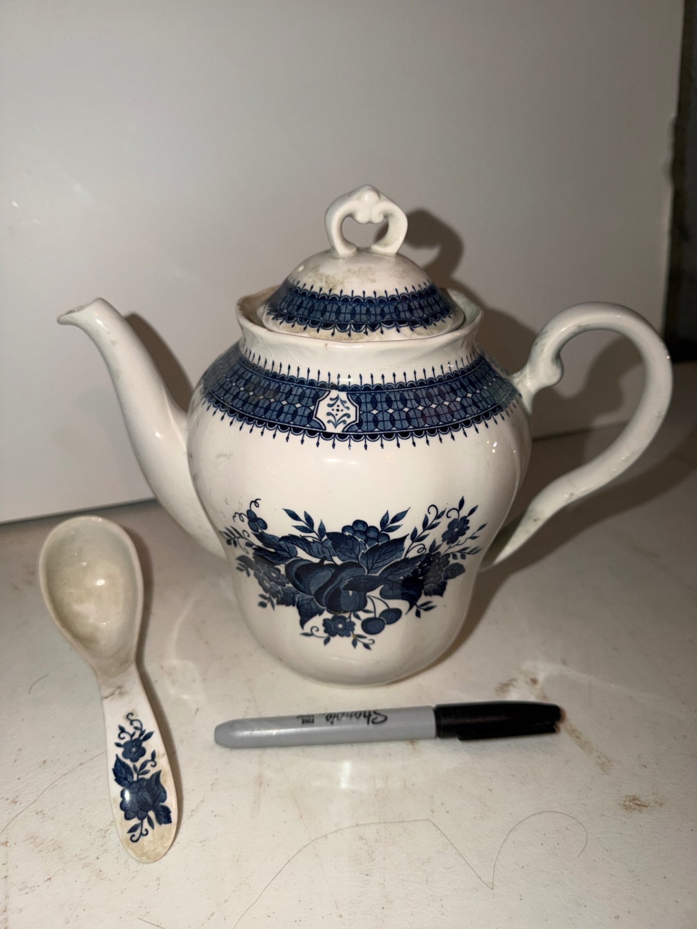 Blue Royal Teapot, glass bottles, and decorative items - image 5 of 12