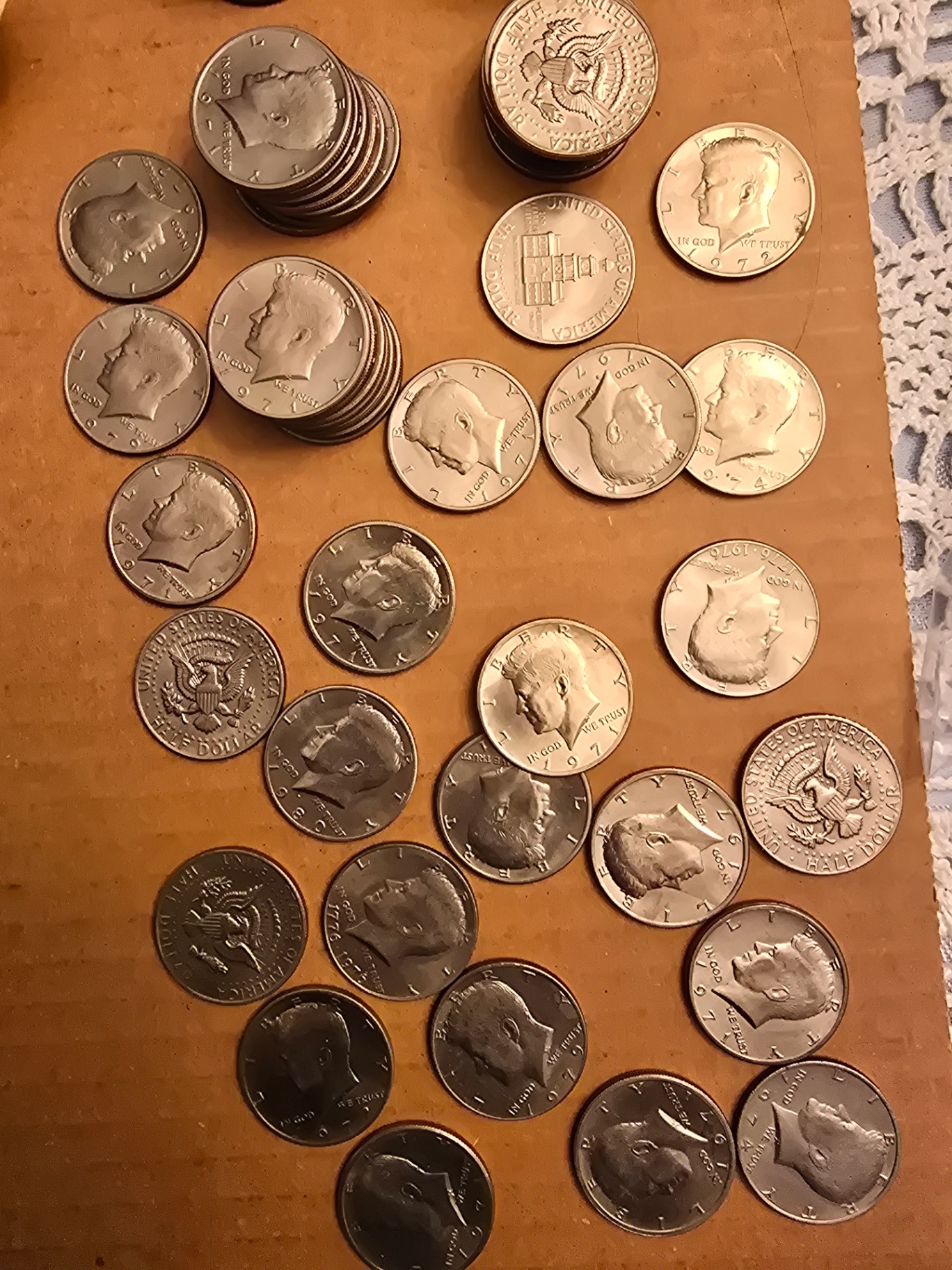 Assorted world coins and Kennedy half-dollars - image 8 of 9