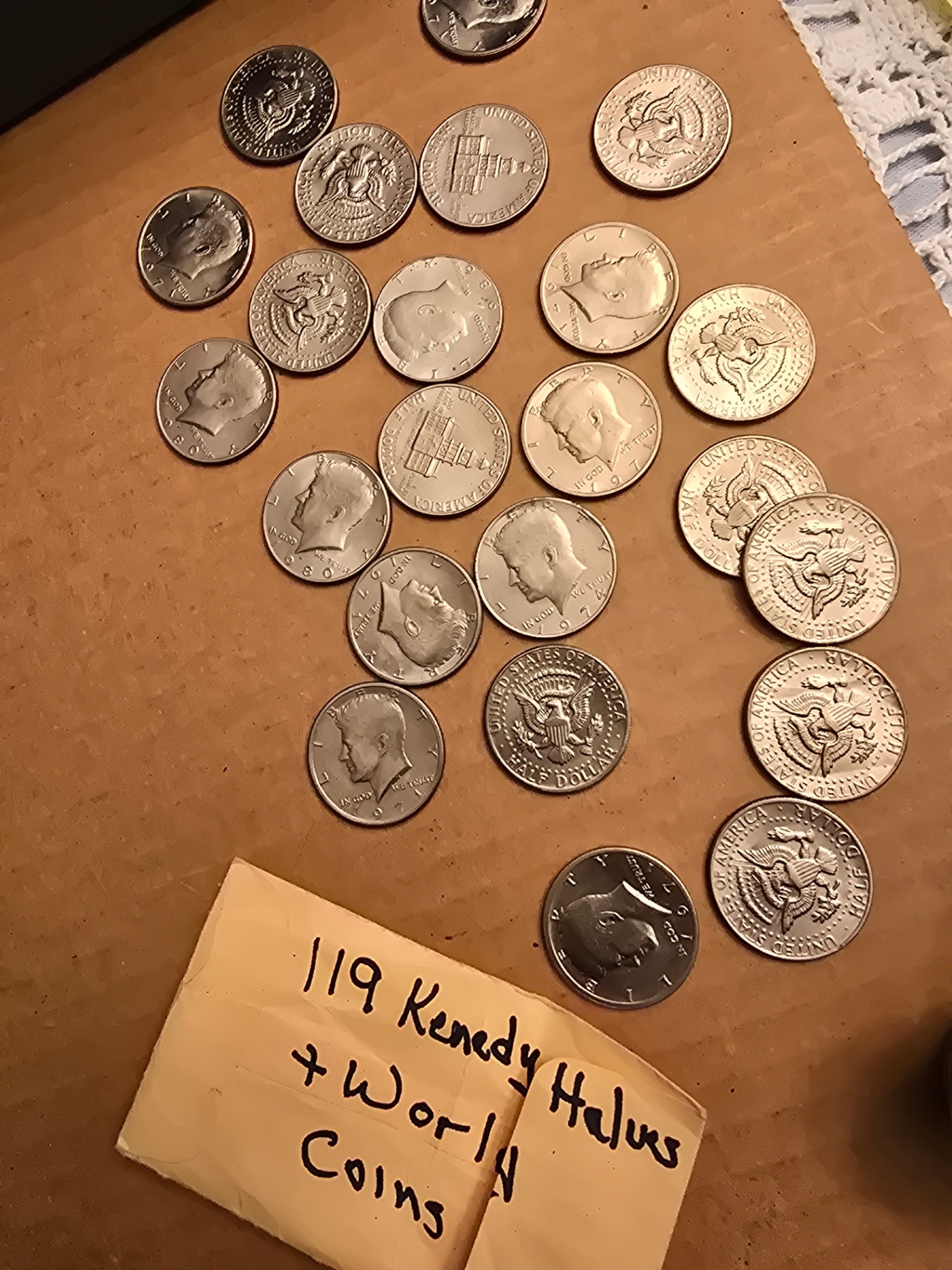 Assorted world coins and Kennedy half-dollars - image 5 of 9