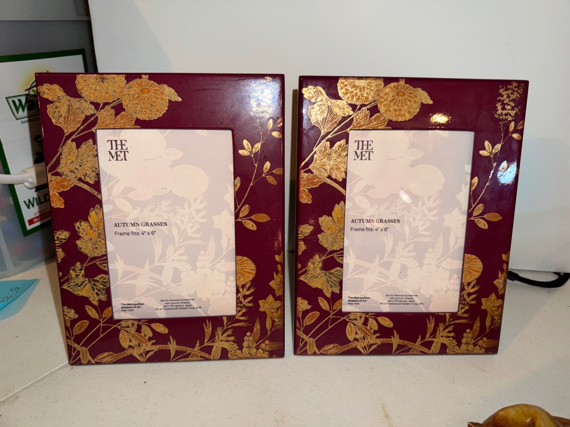 Pair of burgundy floral photo frames with wooden laughing Buddha figurines and decorative box - image 2 of 13