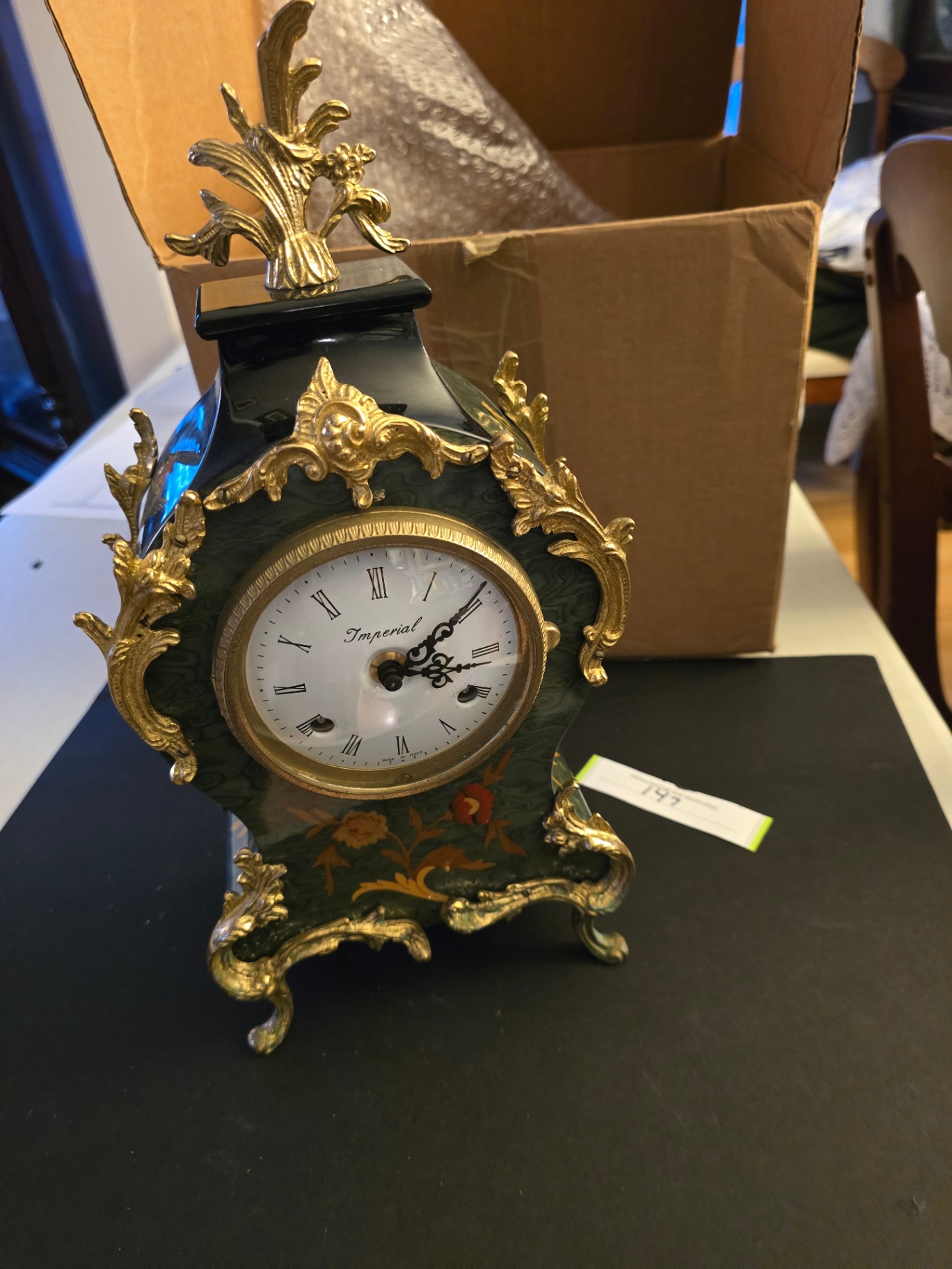 Ornate green and gold mantel clock - image 1 of 11