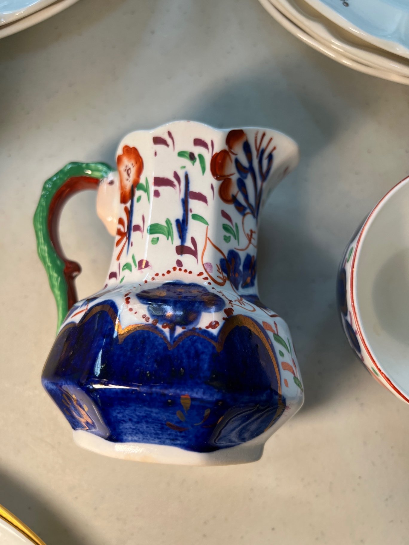 Assorted ceramic dinnerware with floral and fruit motifs - image 11 of 16