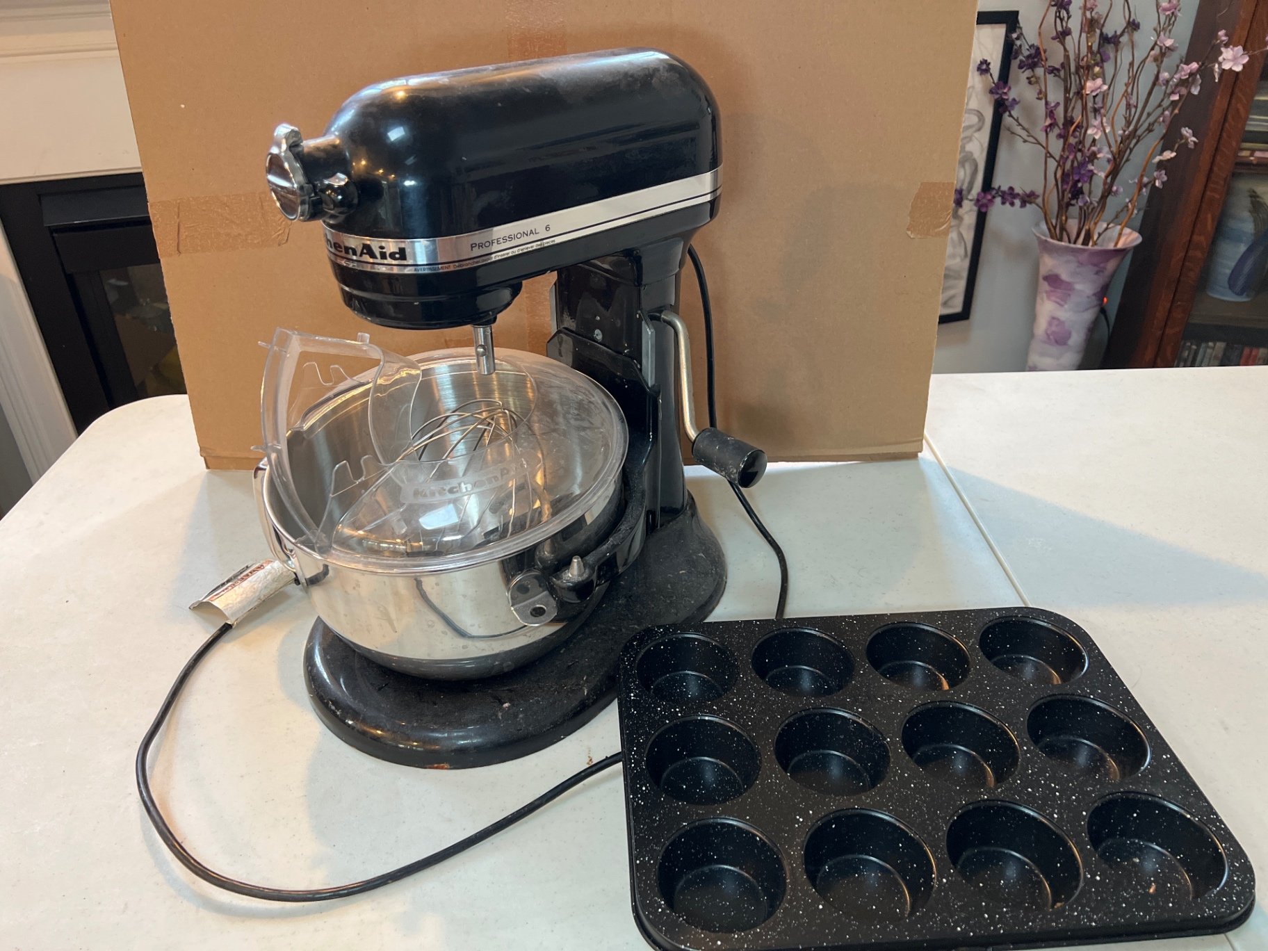 KitchenAid stand mixer with attachments, mixing bowl, and muffin pan - image 1 of 9