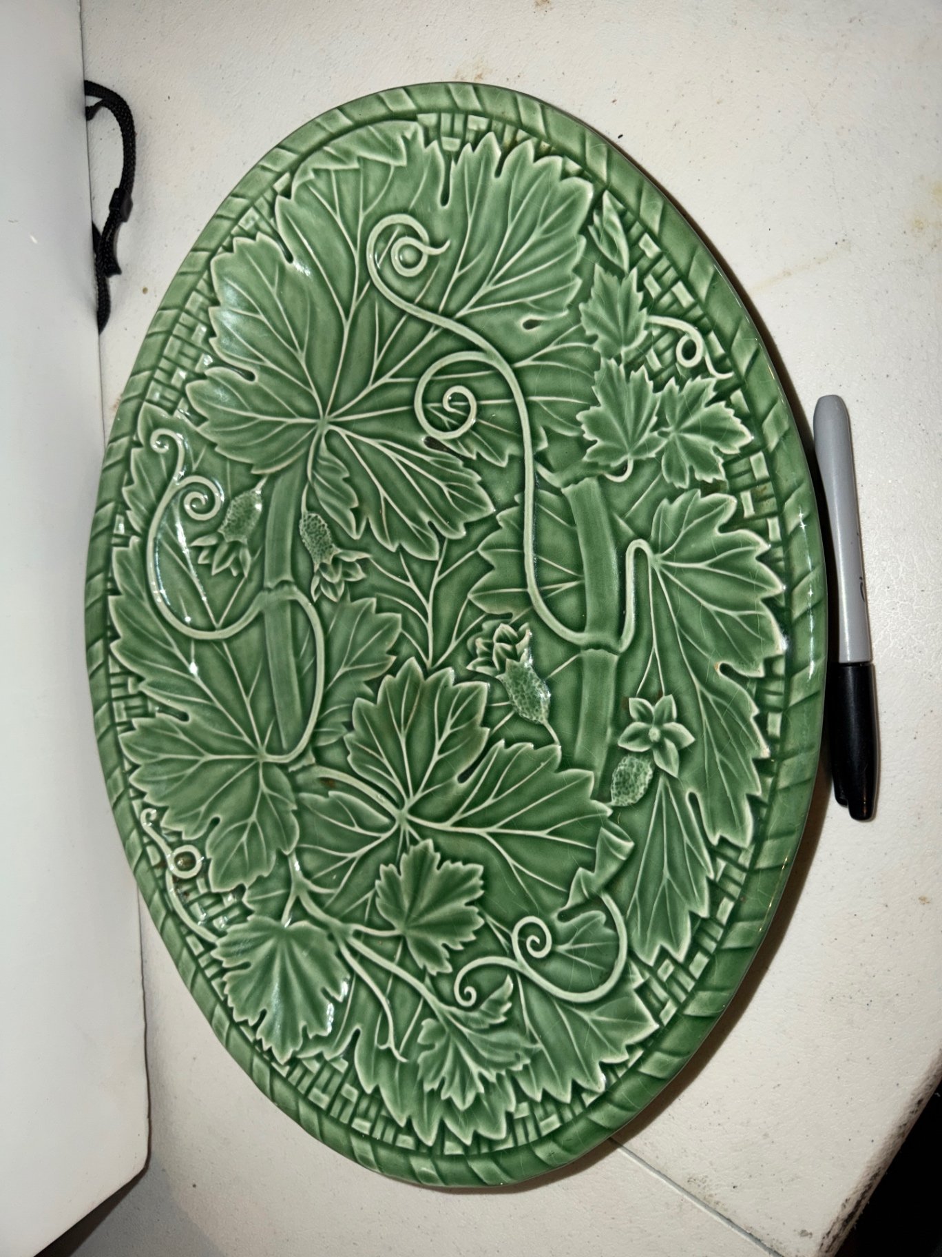 Green ceramic plates with botanical and animal motifs - image 5 of 6