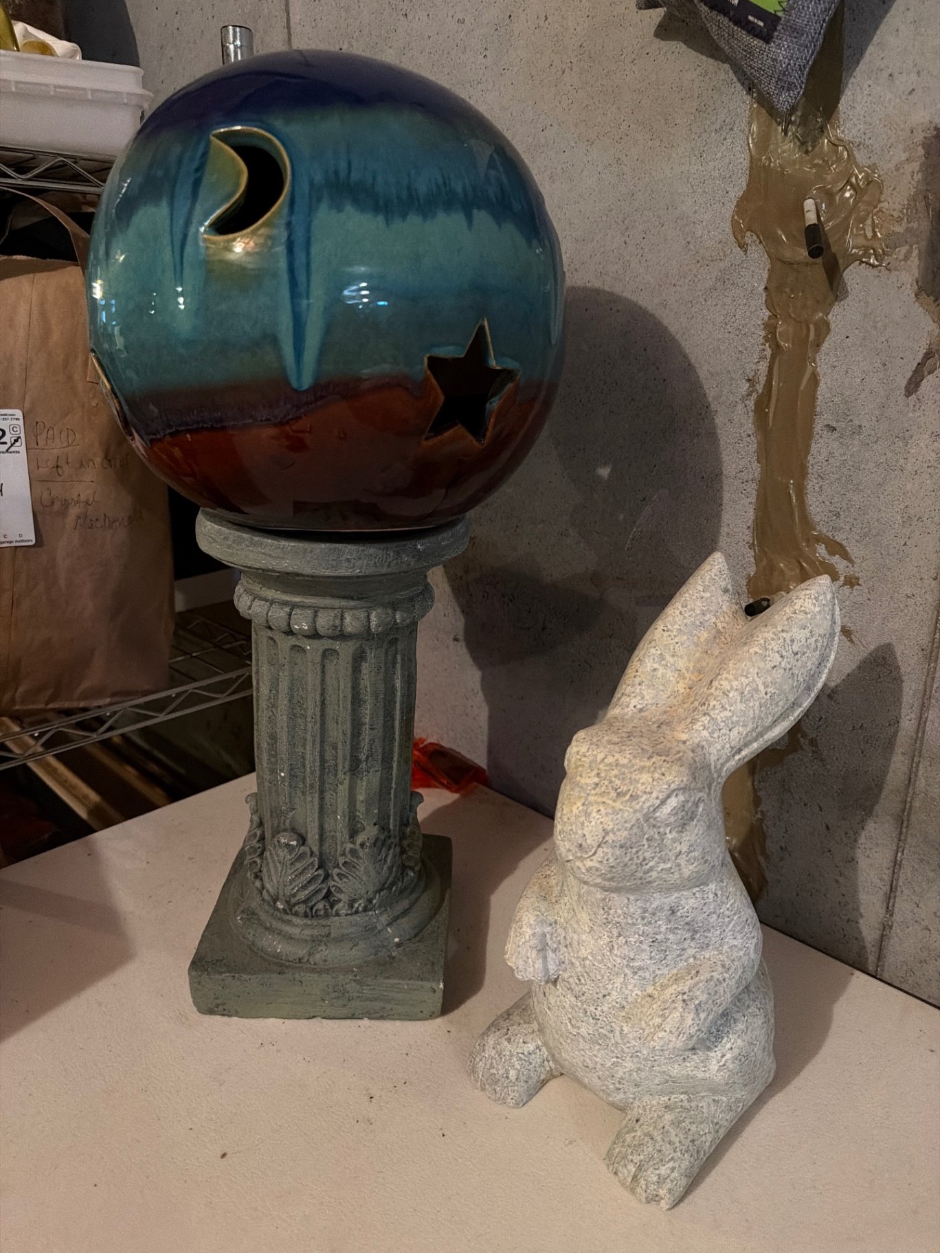 Decorative stone pedestal, blue ceramic globe, rabbit statue - image 1 of 10