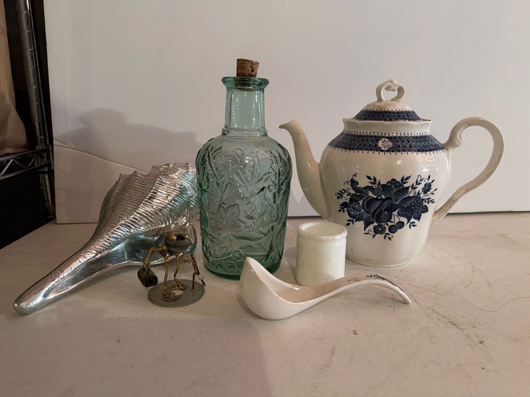 Blue Royal Teapot, glass bottles, and decorative items - image 1 of 12