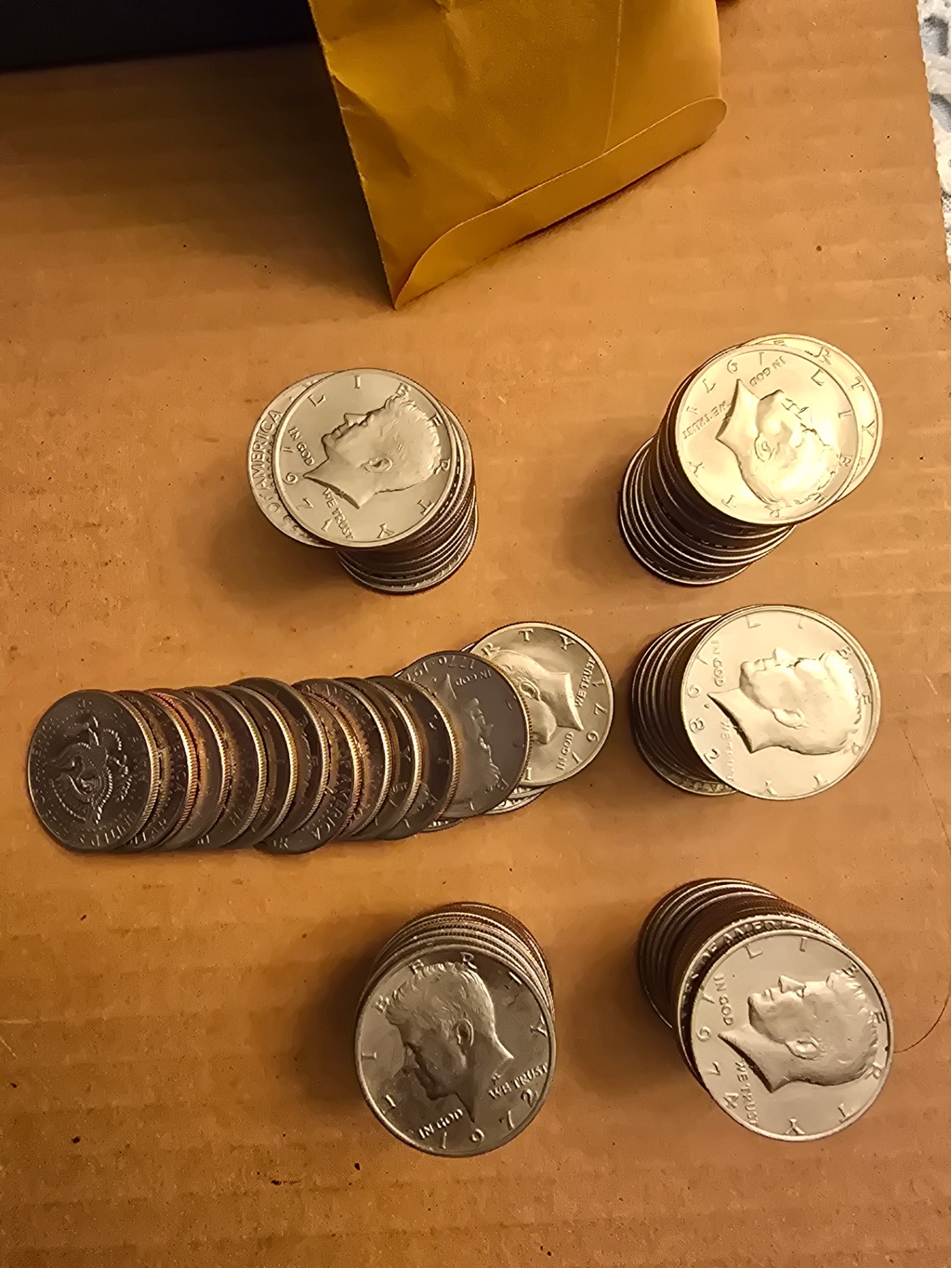 Assorted world coins and Kennedy half-dollars - image 7 of 9