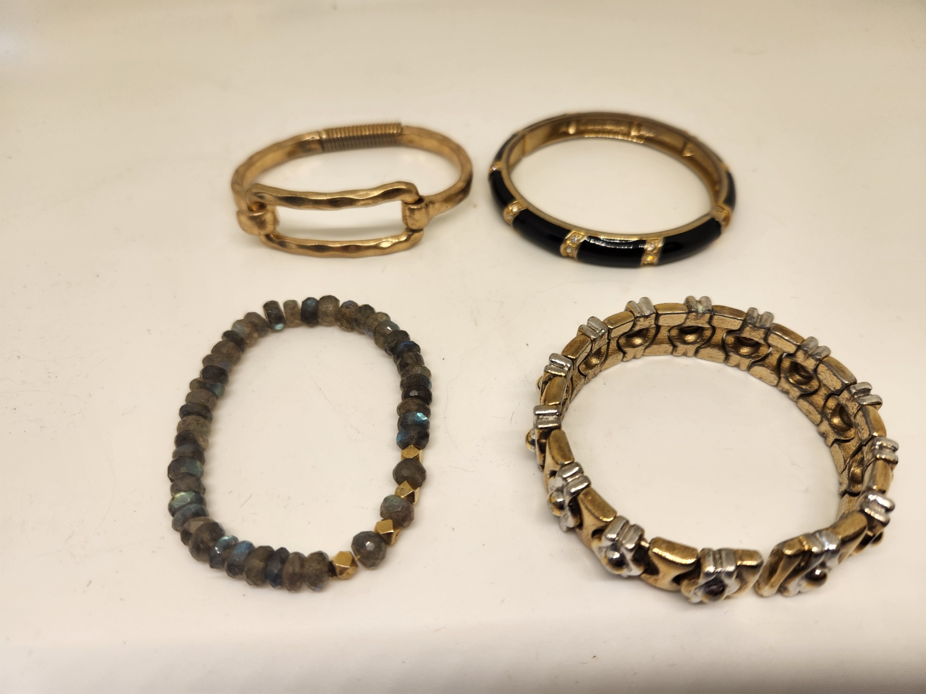 4-Piece Bracelet Lot – Gold Tone Bangle, Black Enamel Hinged Bracelet with enamel and crystals, Silver & Gold two-tone Link & Labradorite Stretch Bracelet - image 1 of 6