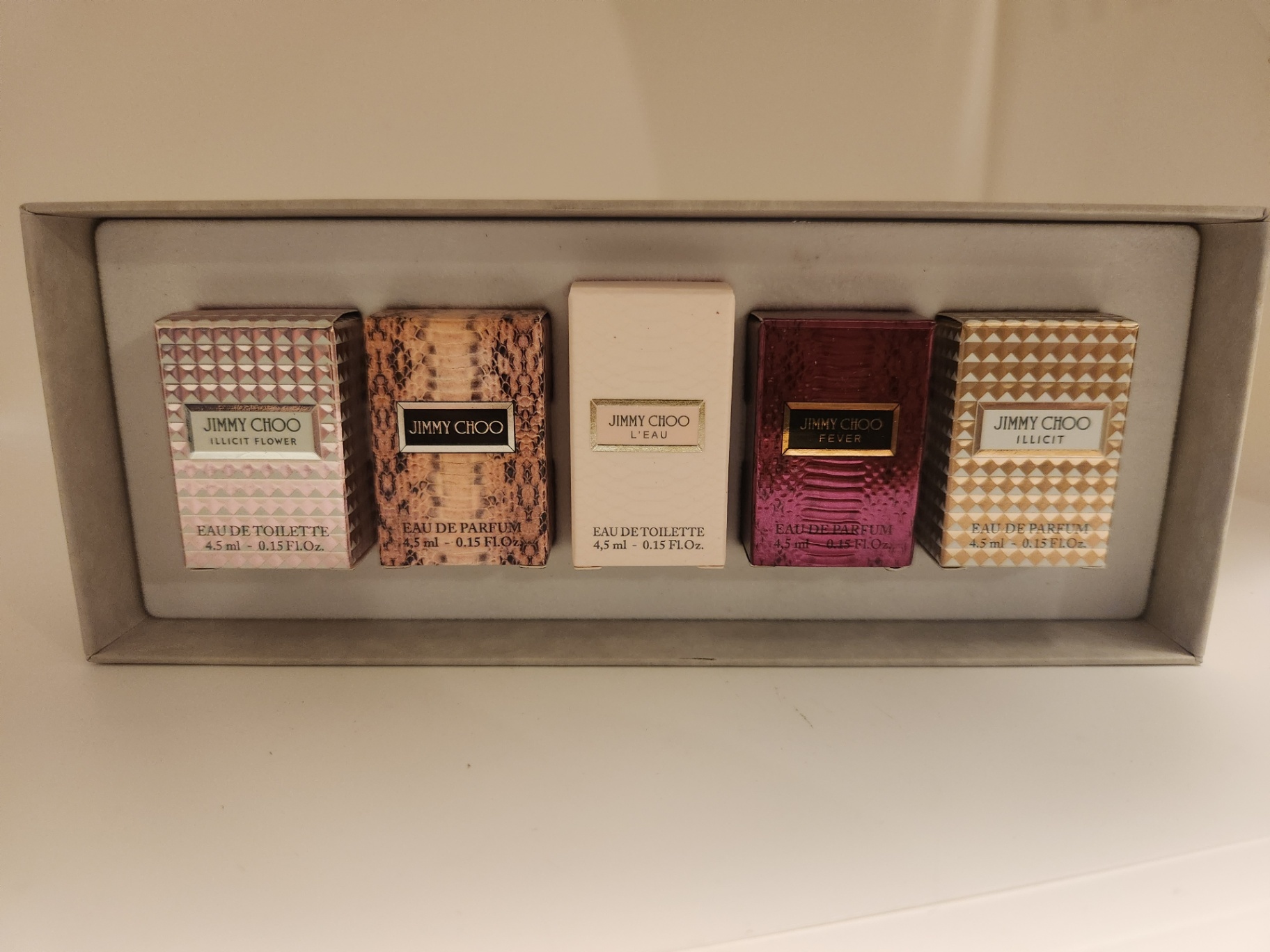 Jimmy Choo Mini Perfume Set — Illicit Flower, Jimmy Choo, L’Eau, Fever, Illicit (4.5 ml ea) New in Box and unusued - image 3 of 5