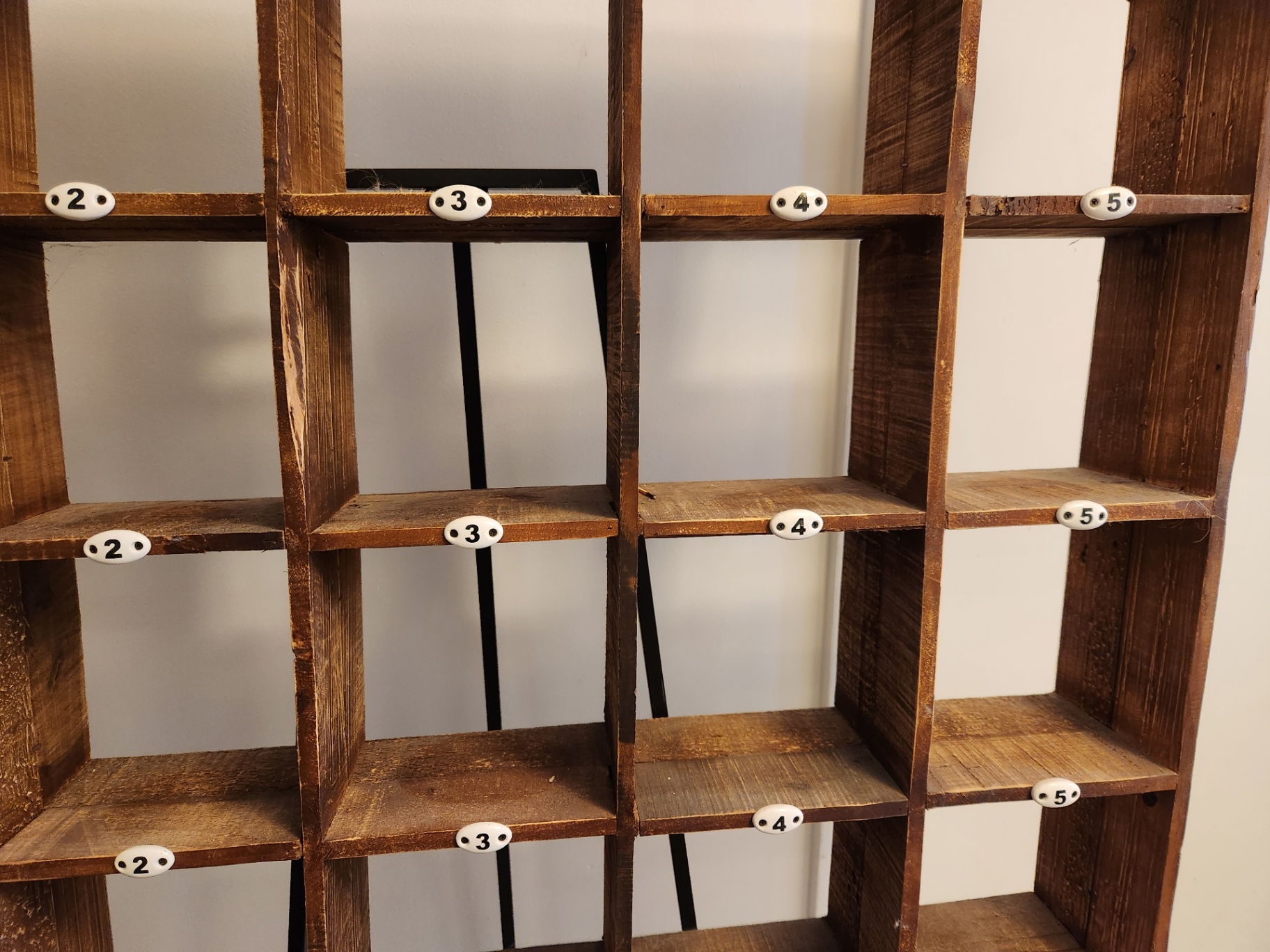 Vintage Wooden Shop Cubby Cabinet with Original Porcelain Number Tags – 20-Compartment Stockroom / Display Rack (c. 1930s–1950s) - image 5 of 6