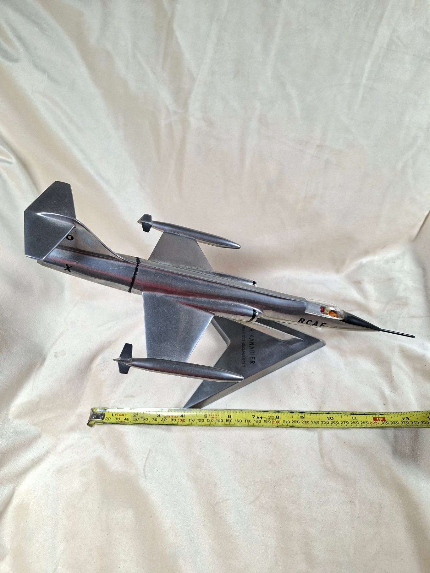 Metal model jet aircraft on display stand, "Der Kanadier December 1969-December 1971" - image 1 of 7