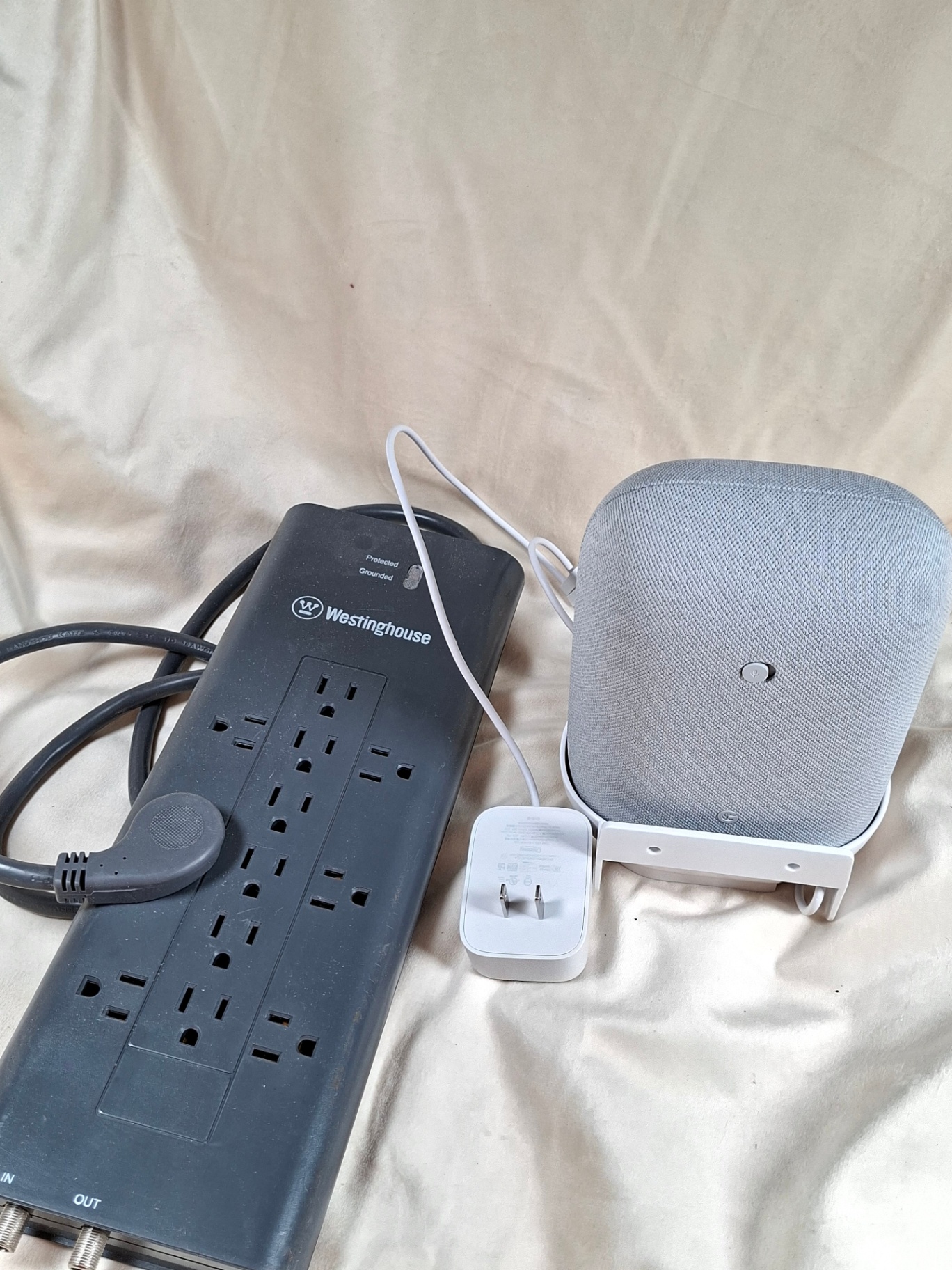 Westinghouse power strip with multiple outlets and a gray fabric-covered speaker - image 3 of 4