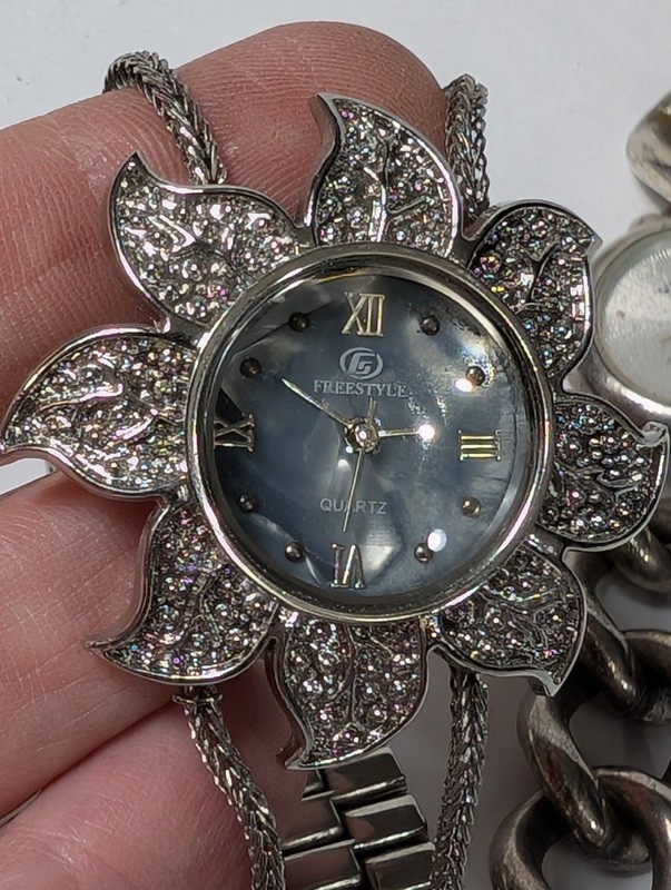 Floral rhinestone pendant watch and silver link bracelet watch - image 6 of 11