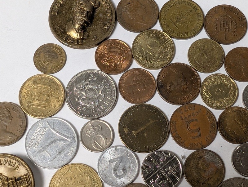 Assorted international coins and tokens - image 4 of 28