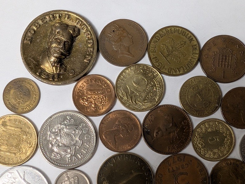 Assorted international coins and tokens - image 5 of 28