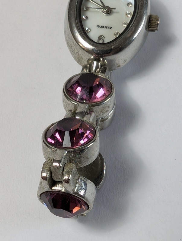 Quartz bracelet watch with purple gemstone accents - image 4 of 15