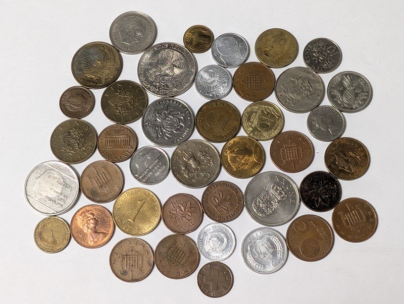Assorted international coins - image 1 of 21