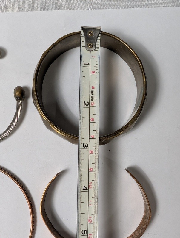 Assorted copper and metal bracelets and bangles - image 12 of 14
