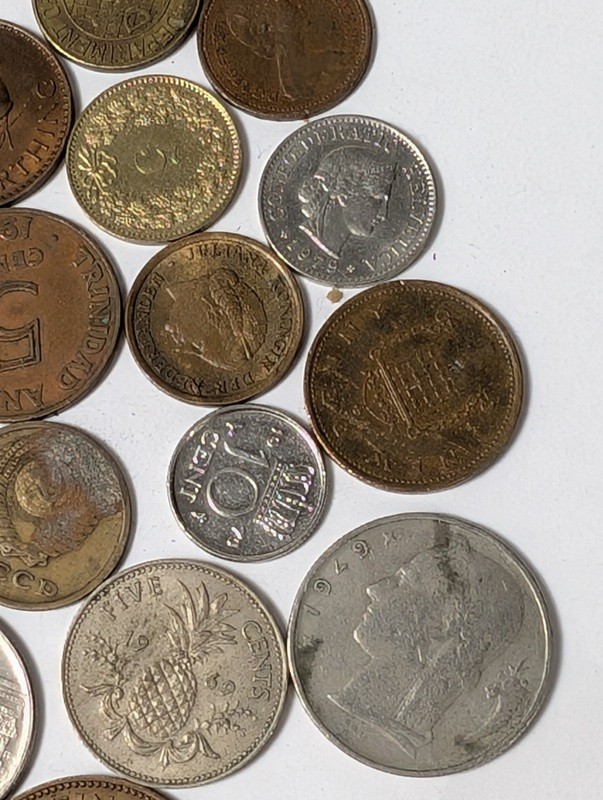 Assorted international coins and tokens - image 10 of 28