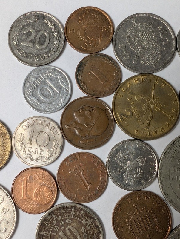 Assorted international coins and tokens - image 5 of 24