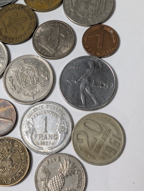 Assorted international coins and tokens - image 9 of 24