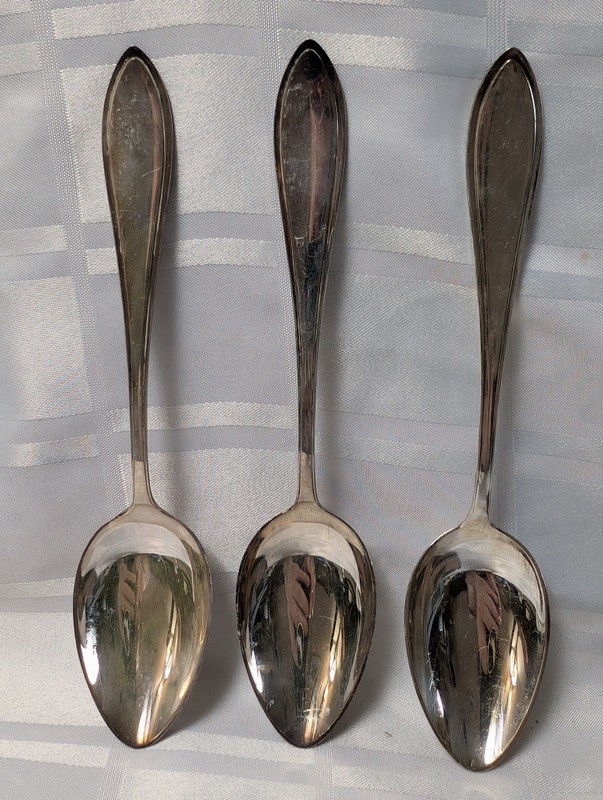 Set of tarnished silver spoons and a serving ladle - image 2 of 10