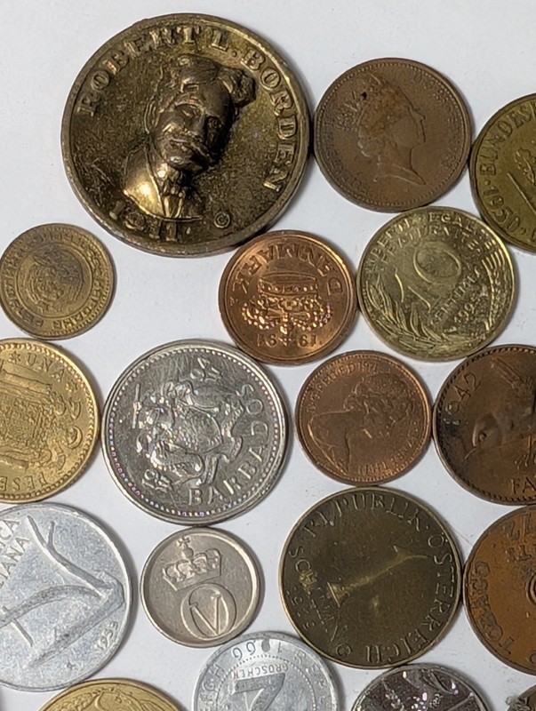 Assorted international coins and tokens - image 13 of 28