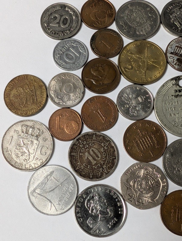 Assorted international coins and tokens - image 3 of 24
