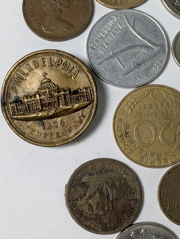 Assorted international coins and tokens - image 18 of 28