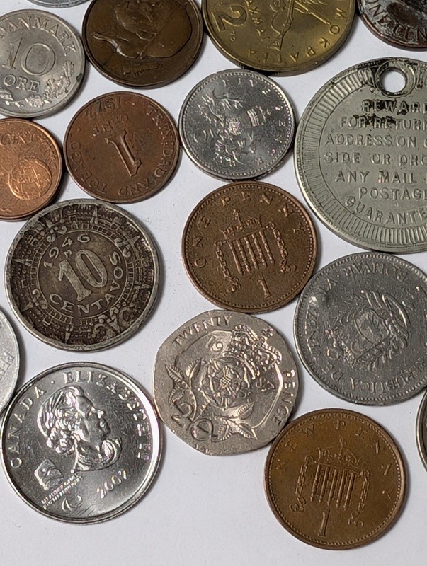 Assorted international coins and tokens - image 13 of 24