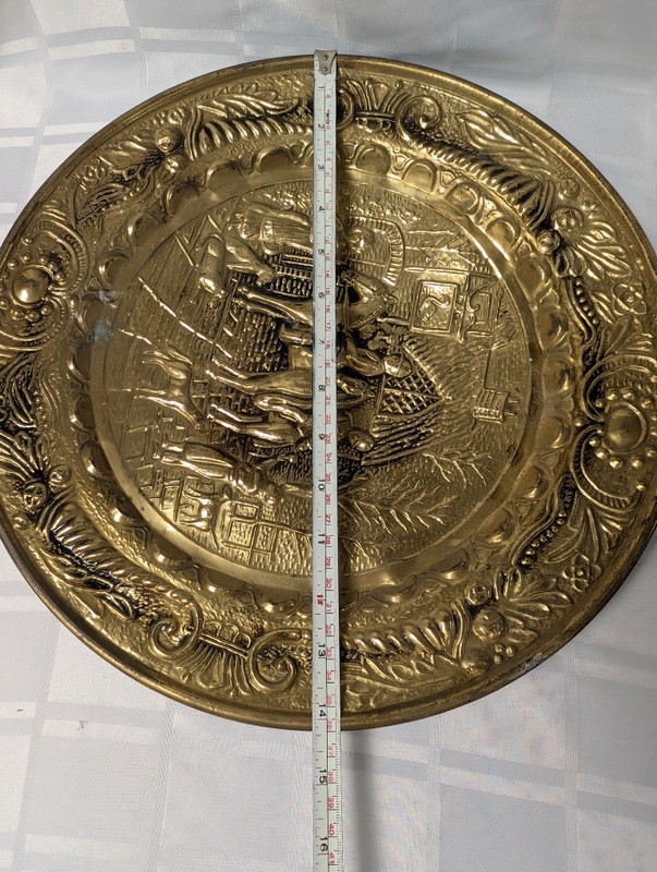Round brass decorative plate with embossed medieval scene - image 9 of 10