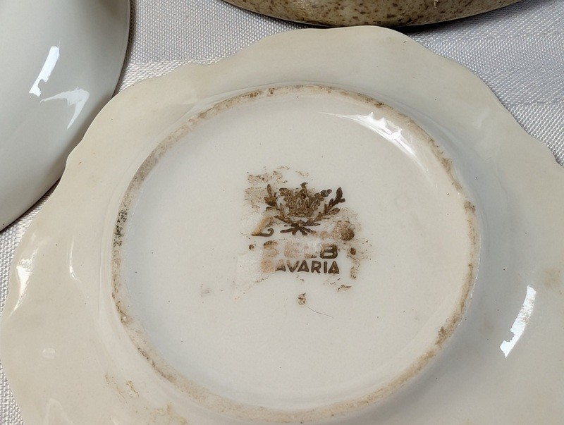 Assorted ceramic dishware with floral, heraldic, and landscape designs - image 13 of 16