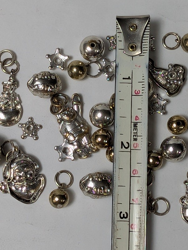 Assorted metal charms and beads (astronaut, bells, stars) - image 15 of 15