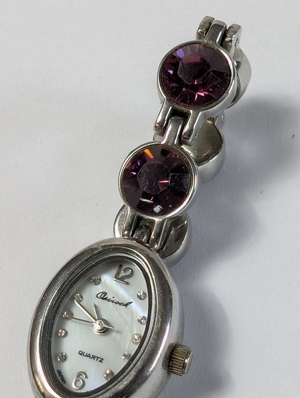 Quartz bracelet watch with purple gemstone accents - image 6 of 15