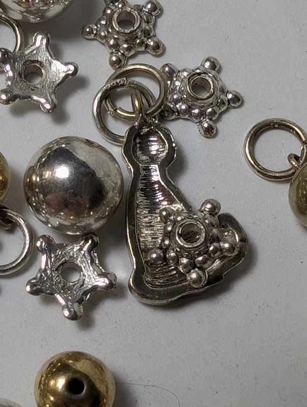 Assorted metal charms and beads (astronaut, bells, stars) - image 12 of 15