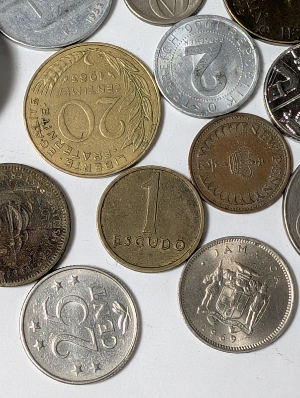 Assorted international coins and tokens - image 17 of 28