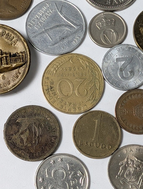 Assorted international coins and tokens - image 27 of 28