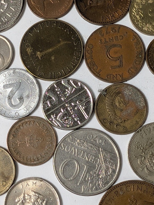 Assorted international coins and tokens - image 16 of 28