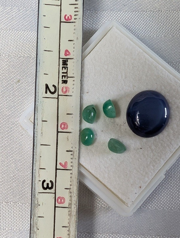 Green teardrop gemstones and a blue cabochon in display box - image 8 of 8
