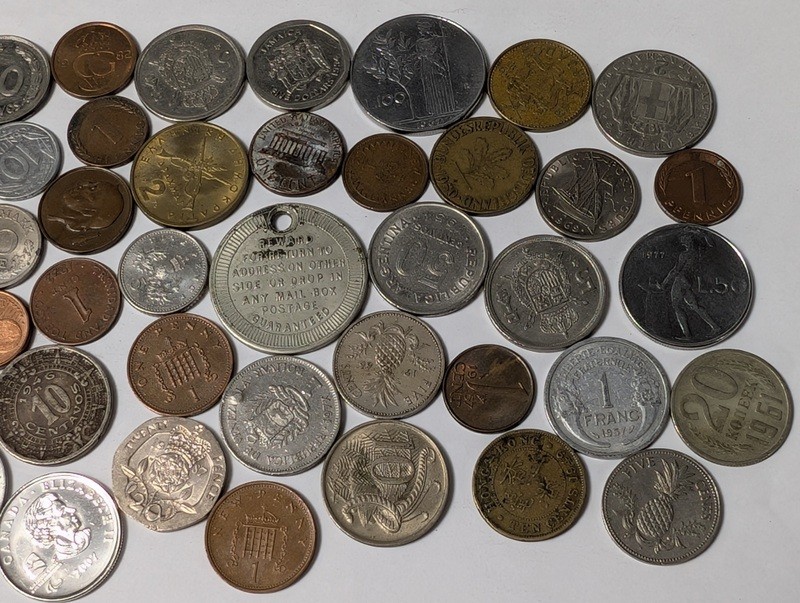 Assorted international coins and tokens - image 2 of 24