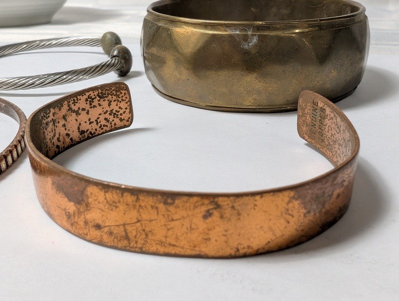 Assorted copper and metal bracelets and bangles - image 11 of 14