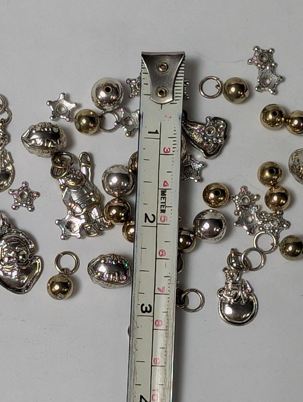 Assorted metal charms and beads (astronaut, bells, stars) - image 14 of 15