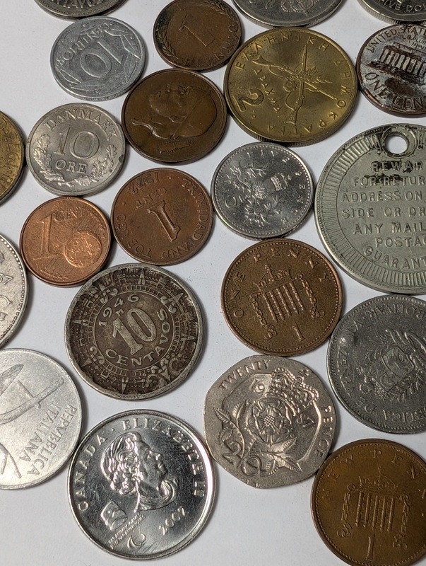 Assorted international coins and tokens - image 4 of 24
